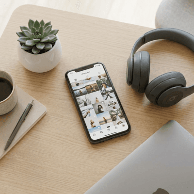 Workspace with phone and headphones